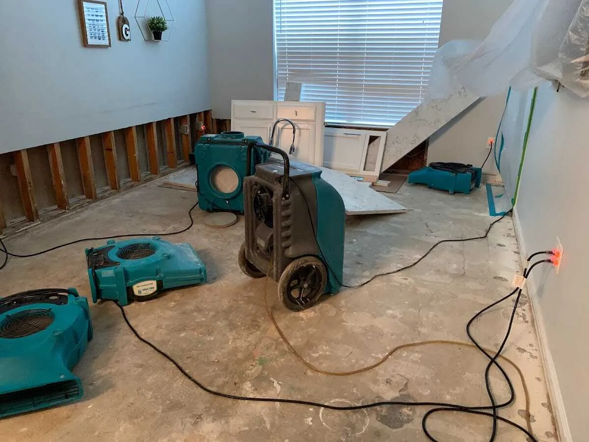 Dehumidifier in flood-cut room for Water Damage Restoration in Westport