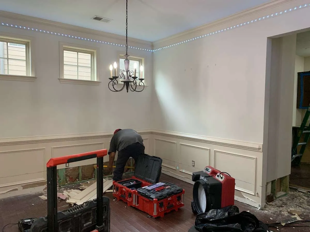 Restoration technician with professional equipment in Westport
