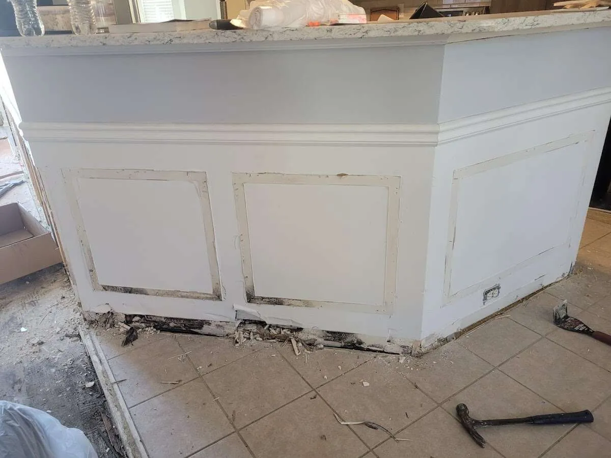 Water damage and mold on kitchen during Sewage Cleanup & Sanitation in Westport